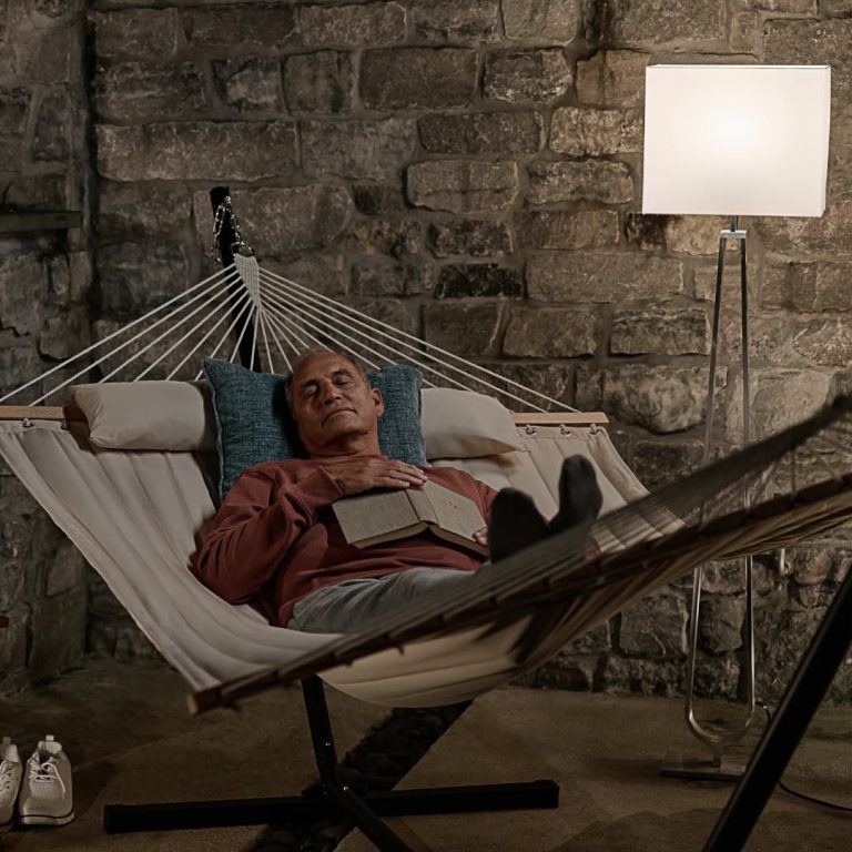 man sleeping in a hammock